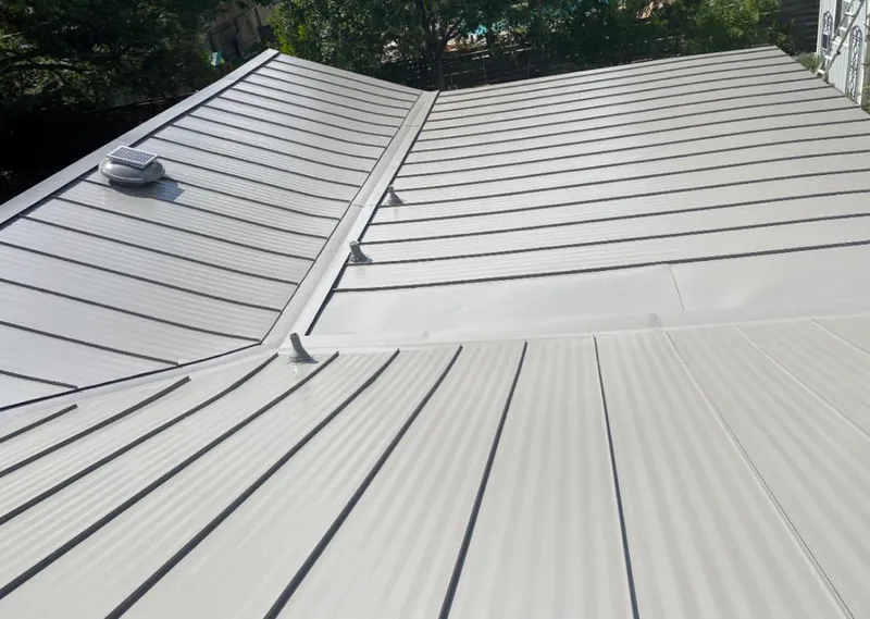 Solar attic fan installed on a metal roof for Roof Ventilation in Sunnyvale